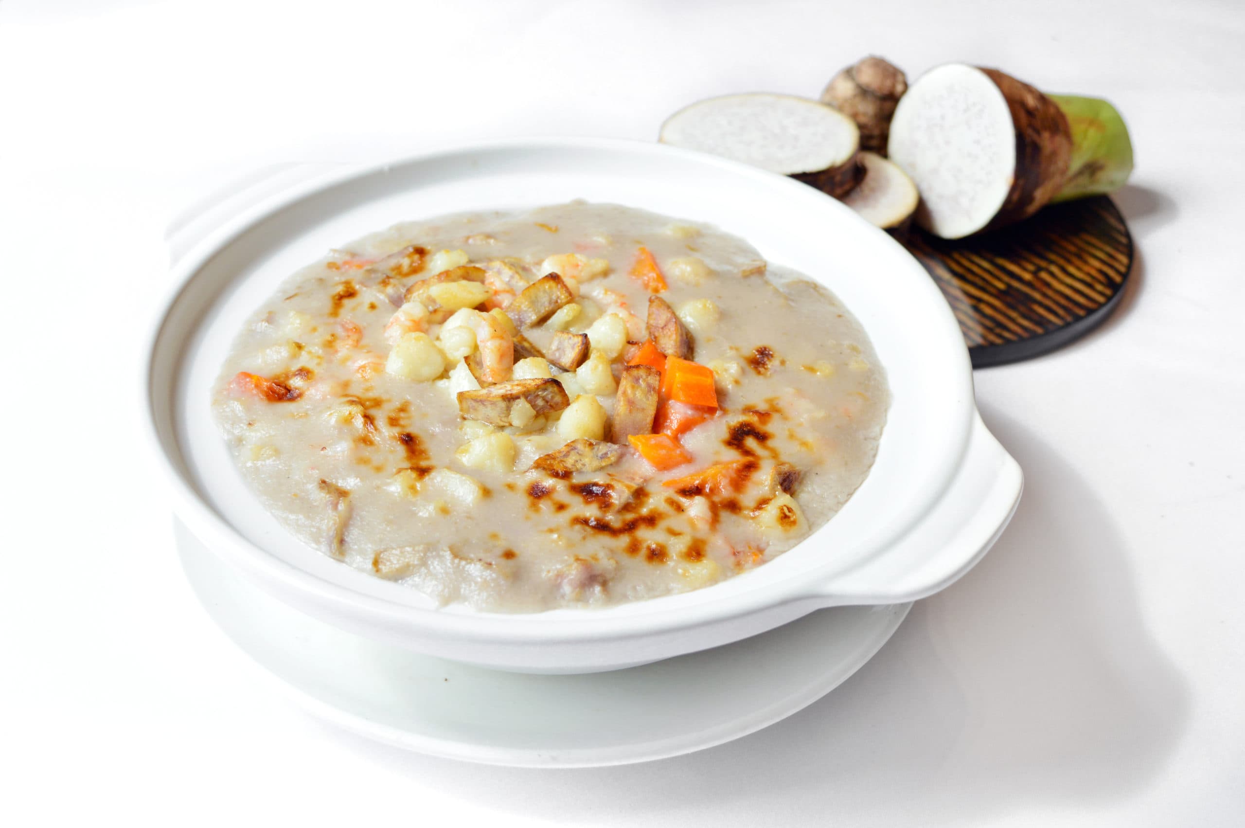 Baked seafood with taro fried rice in clay pot
