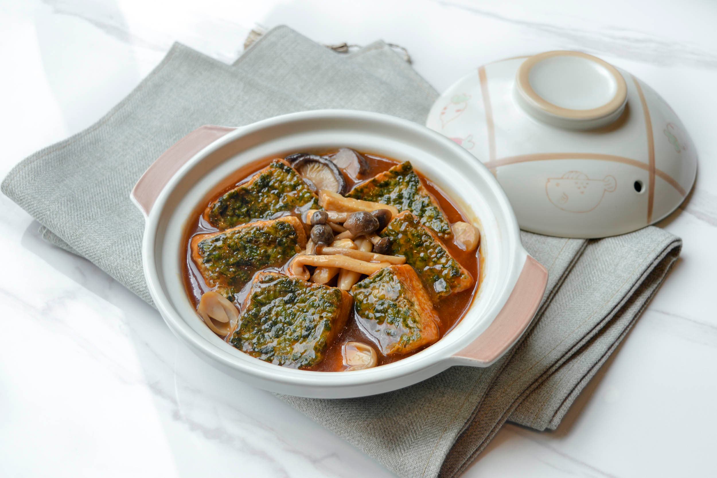 Braised spinach bean curd in abalone sauce