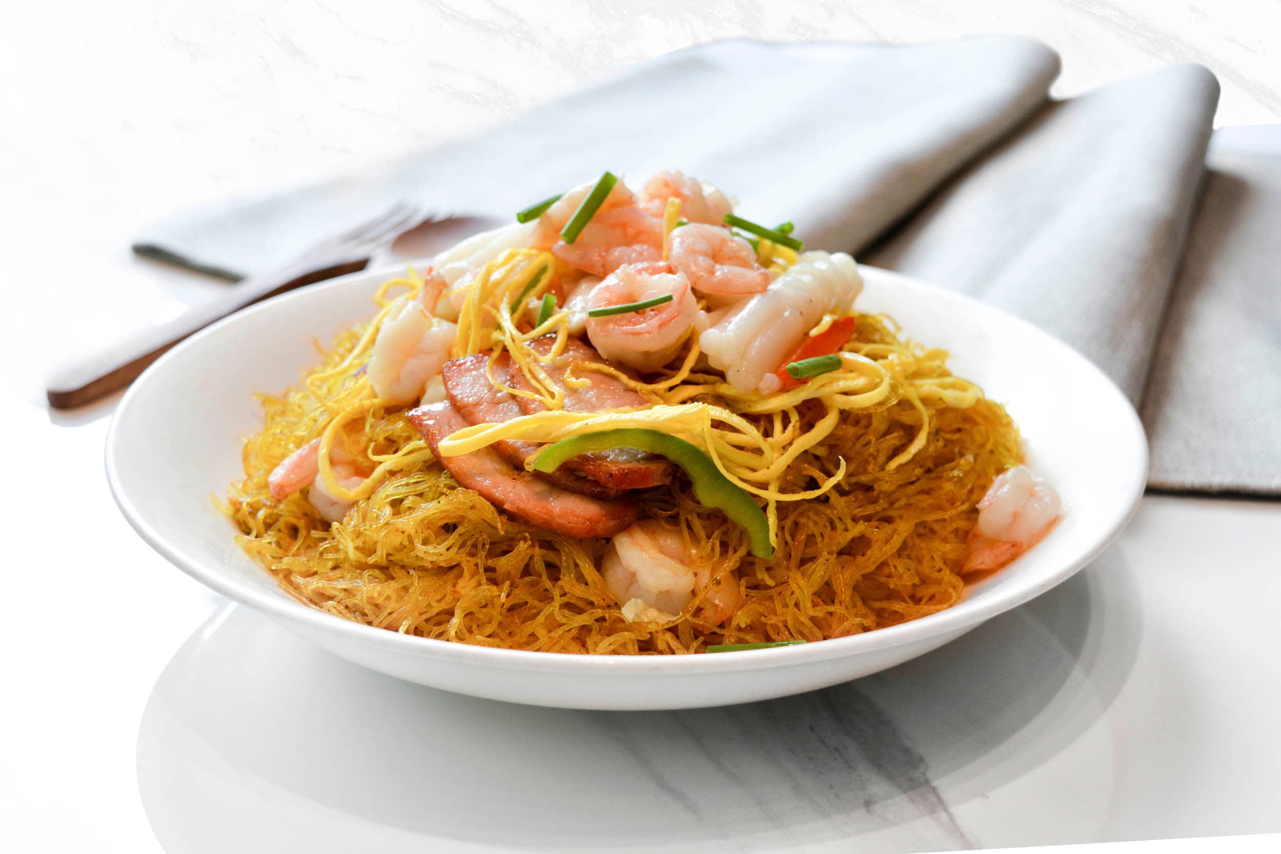 Singaporean-style fried rice noodles with seafood